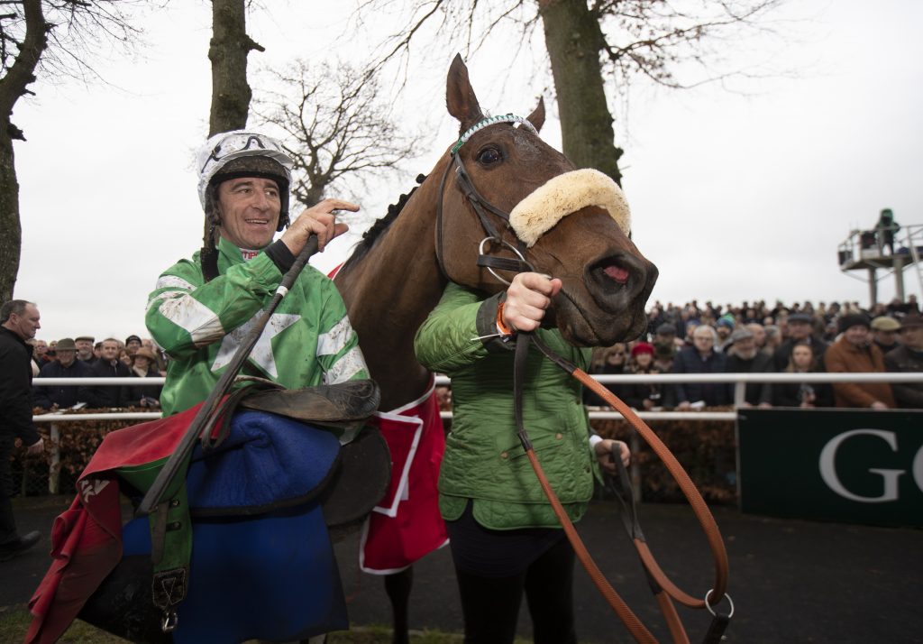 Davy Russell celebrates winning the Galmoy Hurdle with Presenting Percy