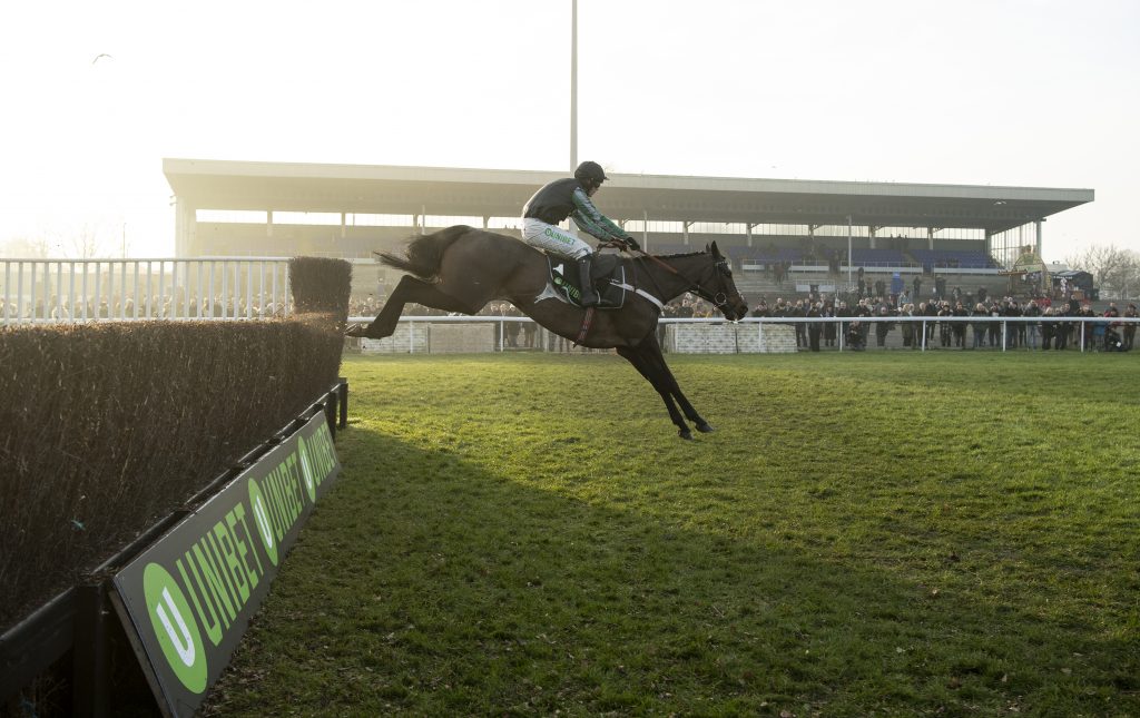 Altior and Nico De Boinville jump the last in the Unibet Desert Orchid Chase, Kempton Park 27/12/18